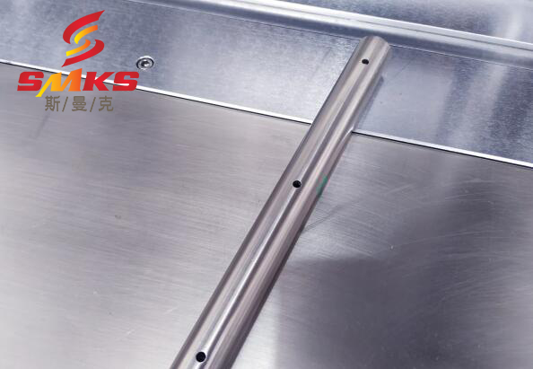 汽油共軌管內(nèi)孔去毛刺，都用斯曼克高速磨粒流